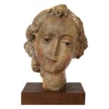 European, 15th Century, A carved head of an angel, original polychrome