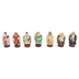 NO RESERVE: A group of seven Oriental/Asian painted porcelain figurines in a leather box
