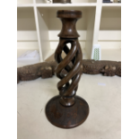 NO RESERVE: Kenyan (?), Late 20th Century, A pair of carved twisted fruitwood candlesticks