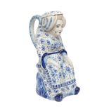 Delft, 18th Century, A large pair of figural ceramic jugs