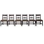 A set of 6 embroidered dining chairs