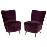 A pair of small plum-upholstered chairs