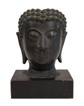 A bronze mask of Buddha