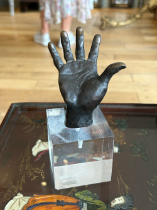 Inscribed 'Marioni', A bronze sculpted study of a hand