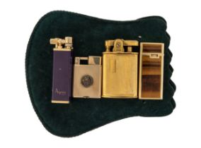 NO RESERVE: A collection of 4 antique lighters, to include Asprey's, Ronson, and Everest