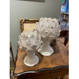 NO RESERVE: A pair of small and large ceramic artichoke candle holders