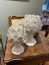 NO RESERVE: A pair of small and large ceramic artichoke candle holders