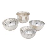 Early 20th Century, Four silver and silver-plate bowls