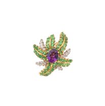 Circa 1980, A pair of diamond, amethyst and peridot palm leaf style ear clips mounted in 18 carat go