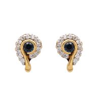 A pair of sapphire and cluster diamond earrings mounted in yellow gold.