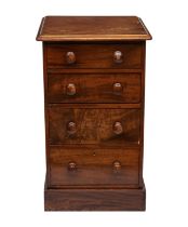A pair of mahogany bedside chest of drawers