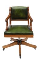 NO RESERVE: Early 20th Century, A green leather upholstered revolving desk chair