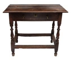 Late 17th/early 18th Century oak side table with single drawer and turned wooden legs, With straight