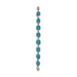 A fine turquoise and 14 carat yellow gold bracelet