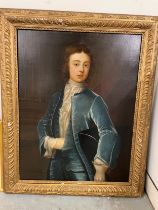 18th Century British School A portrait of a young gentleman in blue silk frock coat