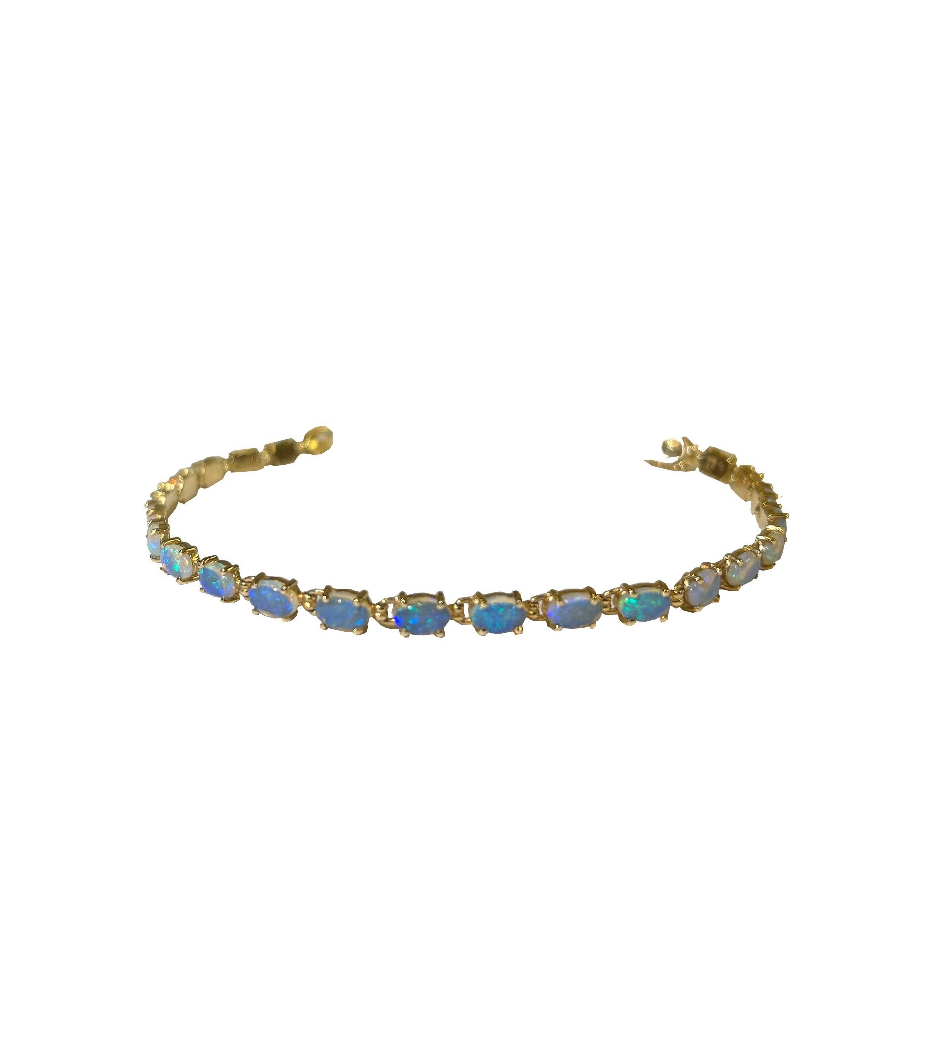 A 14 carat yellow gold and black opal line bracelet