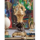 A Louis XVI Gilt and Patinated Bronze Centerpiece