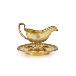 A Large Imperial Russian Silver-Gilt Sauce Boat And Stand, Nicholls and Plinke, St. Petersburg, Circ