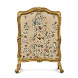 A Louis XV Carved Giltwood Fire Screen with Associated Silk Needlework Panel, Mid-18th Century