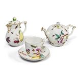 A Meissen Teapot and Cover, A Milk Jug and Cover, and A Cup and Saucer, Circa 1745