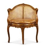 A Louis XV Caned Beechwood Fauteuil de Cabinet, Circa 1765, Stamped J.C. BRIOIS