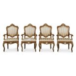 A Set of Four Venetian Rococo Red Lacquer and Parcel-Gilt Armchairs, Mid-18th Century