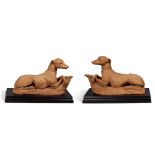 A Pair of Large Terracotta Models of Recumbent Whippets