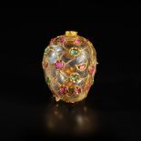 A Mughal rock crystal mango-shaped flask inlaid with rubies and emeralds set in gold, India, Mughal,