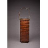 A Japanese bamboo basket, Edo period, 19th century