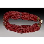 A Naga red glass beaded necklace, India, Nagaland, 20th century