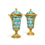 A pair of Louis XVI gilt-bronze mounted S&#232;vres pots pourris vases and covers, circa 1775