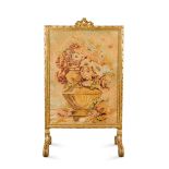 A Louis XVI style carved giltwood firescreen, early 20th century