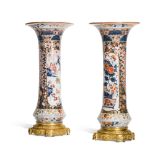 A pair of French gilt-bronze mounted trumpet vases, the porcelain by Samson of Paris, circa 1870