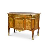 A Transitional gilt-bronze mounted, tulipwood, amaranth and marquetry commode, circa 1775, in the ma