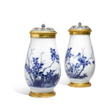 A pair of gilt-bronze mounted Chinese blue and white porcelain vases, the porcelain mid-17th century