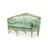 A Louis XV carved giltwood canap&#233; en gondole, mid-18th century, in the manner of Jean-Baptiste