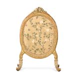 A Louis XVI carved giltwood firescreen, circa 1780, in the manner of Georges Jacob