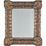 An embossed silver-plated mirror, early 20th century, possibly Spanish