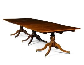 A George IV style mahogany triple pedestal dining table