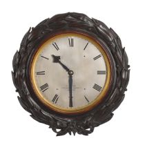 Vulliamy No.1905. A carved mahogany wall timepiece, London, dated 1851