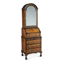 A small Queen Anne ebonised and yew bureau cabinet, early 18th century