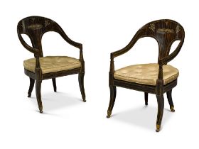 A pair of Regency simulated-coromandel 'Roman' open armchairs