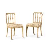 A pair of George III parcel-gilt pale green-painted side chairs, circa 1790, the design attributed t
