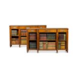 A pair of Regency rosewood breakfront open bookcases, circa 1820