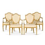A set of four George III carved giltwood open armchairs, circa 1790s, possibly by Gillows