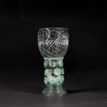 An important Dutch diamond-point engraved calligraphic green glass roemer by Willem Jacobszoon van H