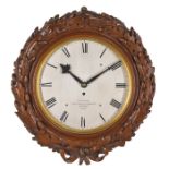 Vulliamy No.1904. A carved mahogany wall timepiece, London, dated 1851