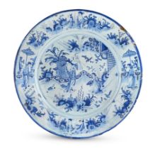 An English delftware initialed and dated large Chinoiserie dish, 1698, attributed to Brislington