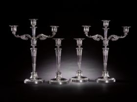 A suite of silver candelabra and candlesticks, Paul Storr of Storr & Co. for Rundell, Bridge & Runde