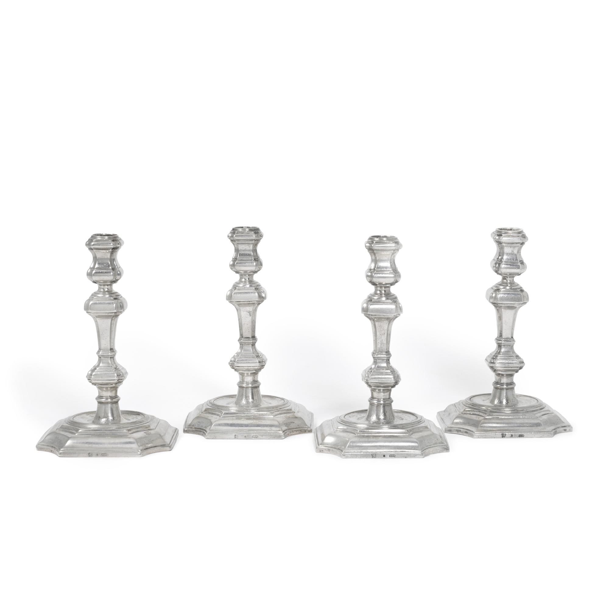 Royal: a set of four German silver candlesticks, Conrad Hermann Mundt, Hanover, 1726